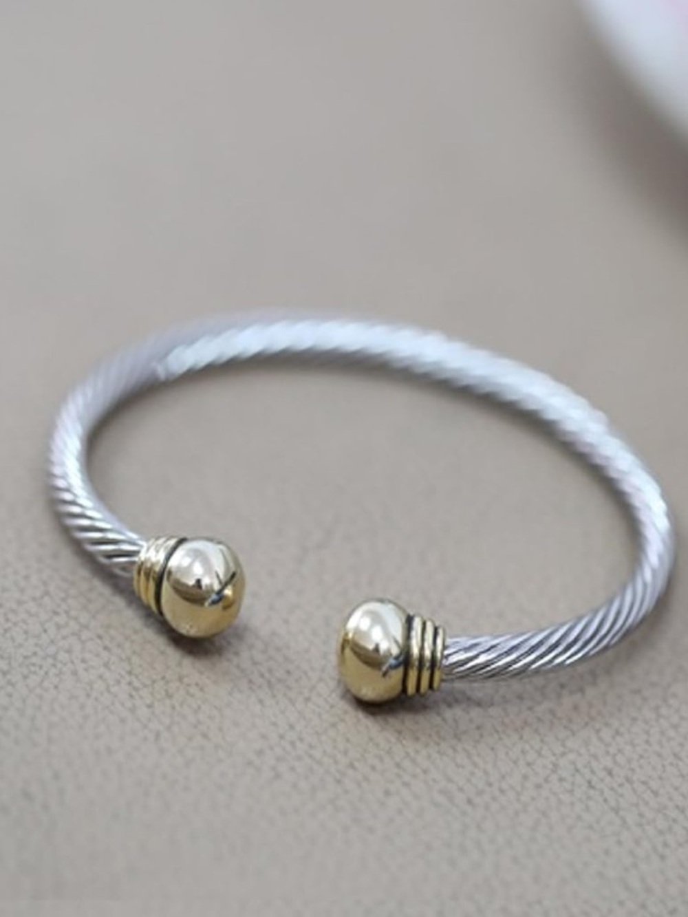 Two-Tone Silver Cable Cuff Bracelet with Gold End Caps